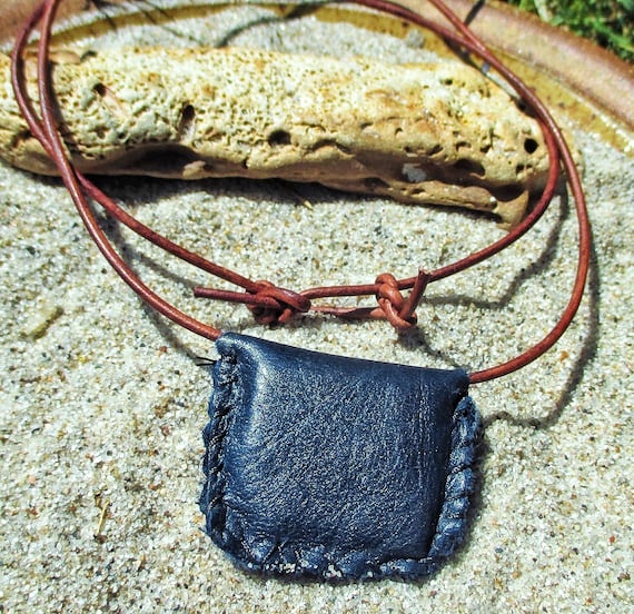 West African protective amulets gris-gris leather pouch carried by traders for financial protection