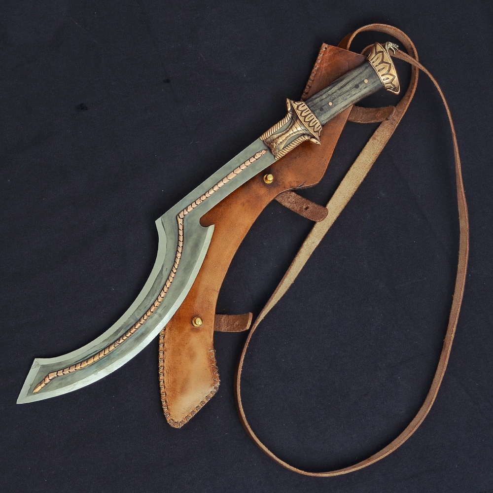 sacred artifact kings used Khopesh ancient Egyptian curved sword pharaoh Tutankhamun Cairo Museum